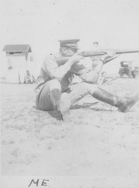McMullen Firing a Rifle From a Seated Position, Ca. 1928-30 (Source: Barnes)
