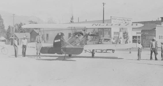Travel Air NC647H in Front of the Hawthorne Pool Hall, Date Unknown (Source: Guyer)