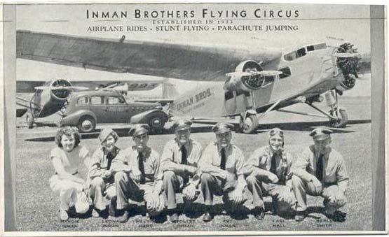 NC5577 in Inman Brothers Livery, Staff in Front, Ca. 1934-1939 (Source: Web)