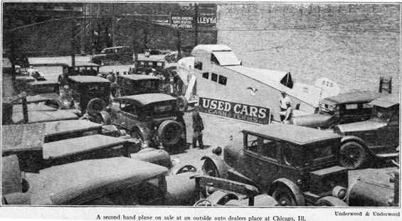 The Hoff Cabin (NC575) Among Automobiles in a Used Car Lot, Ca. 1929 (Source: Parks)