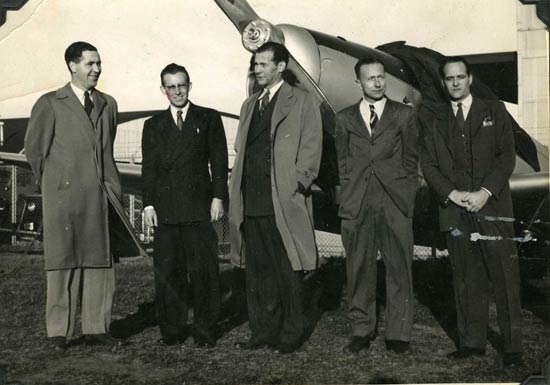 Ace Bragunier with Unidentified Gentlemen