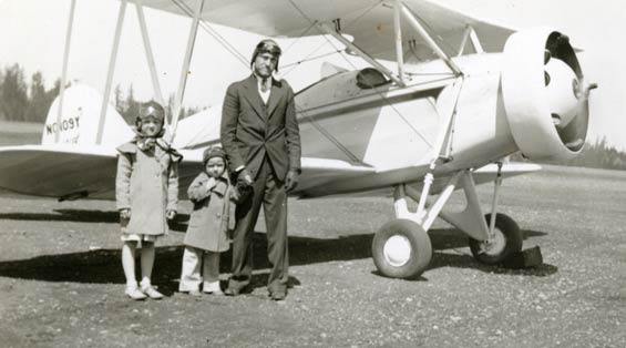 Donning Flying Helmets and Goggles, the Collier Children pose With Their Father in Front of the Waco That Transported the Family to Texas (Source: Ringhoffer via Woodling)