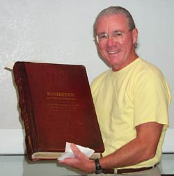 Author/Editor/Webmaster G.W. Hyatt Holding the Original Davis-Monthan Airfield Register (2002)